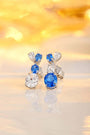 These S925 silver stud earrings have a convenient clasp design. The oval - shaped blue lab - grown gemstones with clear color
