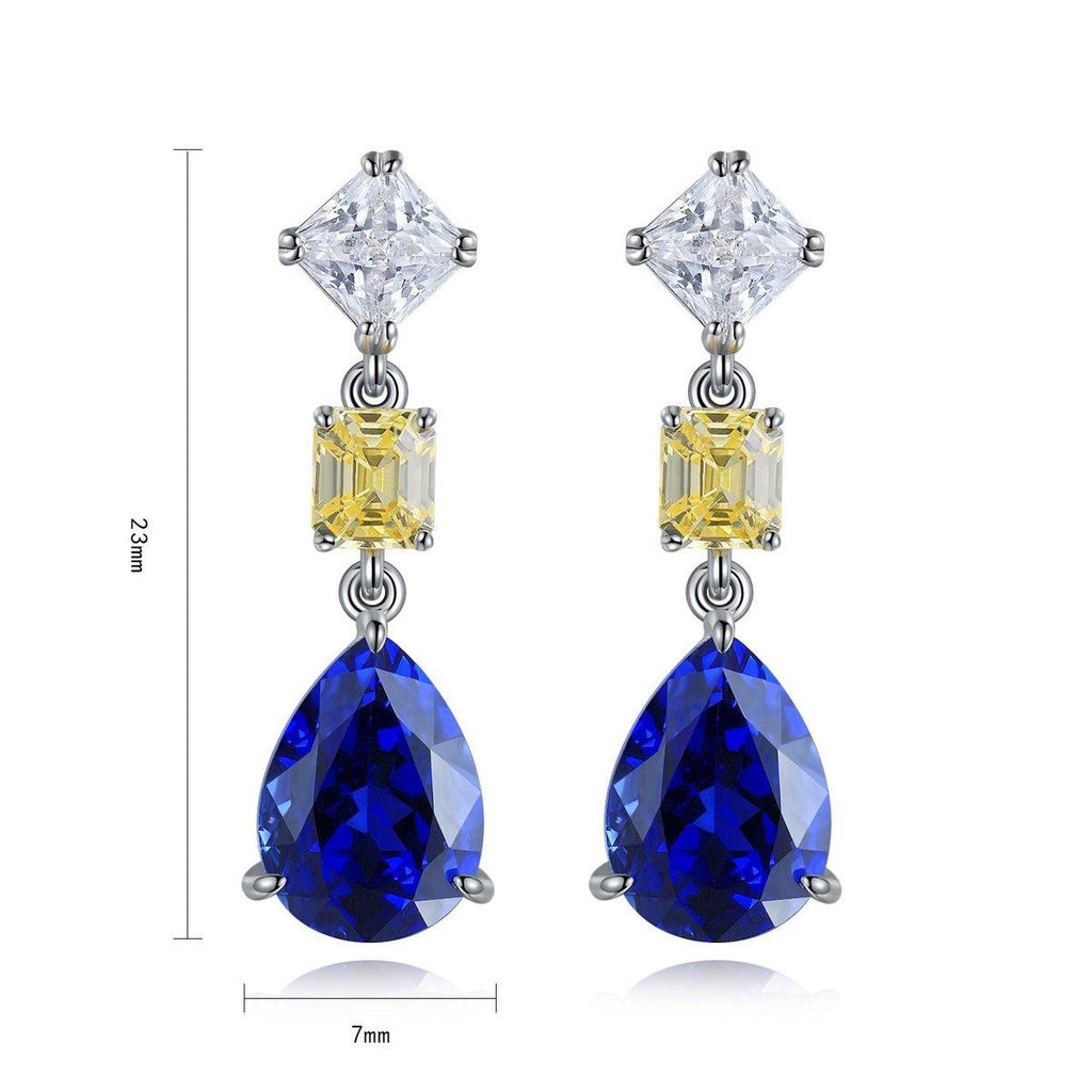 These stud earrings are crafted from S925 silver with a secure and reliable back clasp design. The clear and royal blue lab-g