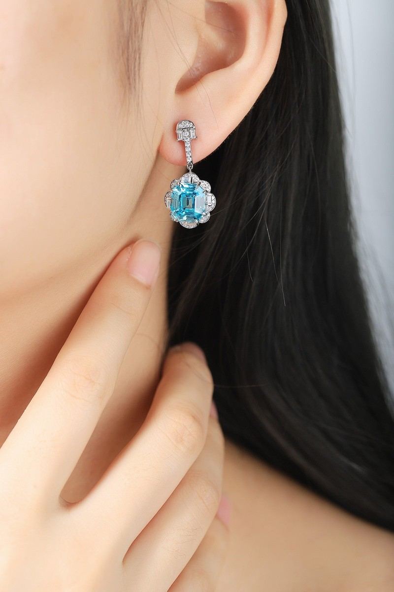 The S925 silver earrings feature a fine - crafted clasp. Lake - blue lab - grown cobalt spinel in halo design, fresh color, c