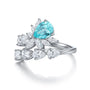 This S925 silver ring has an open design. The lab-grown Paraiba's dreamy indigo blue makes it totally fashion-forward.