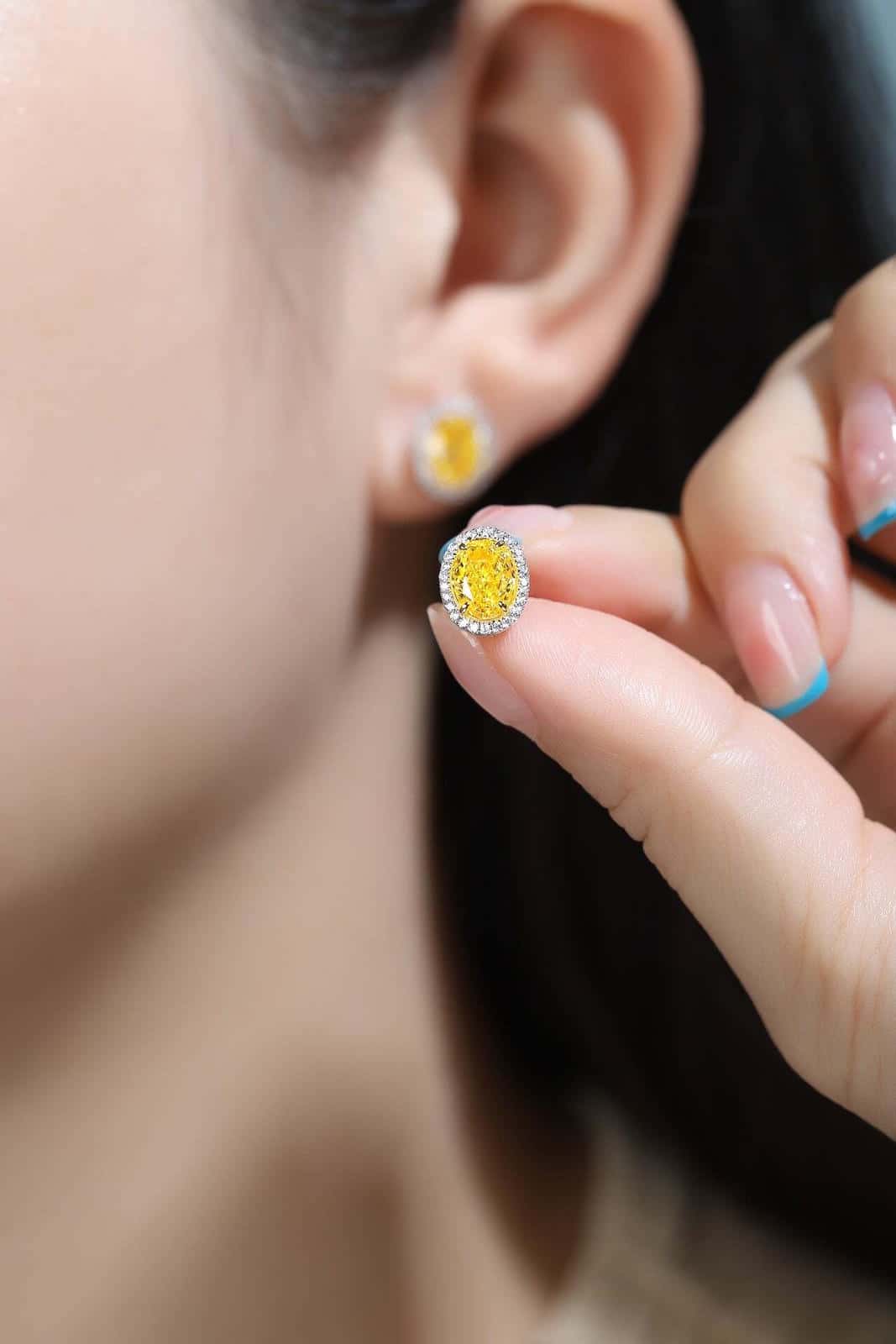 Made of S925 silver, simple clasp design, yellow oval cubic zirconia adds vitality to the look.