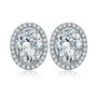 S925 silver stud earrings with convenient clasp, clear cubic zirconia in pure color, oval - shaped and simple.