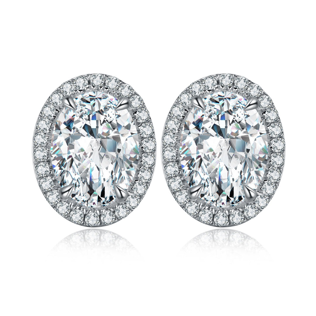 S925 silver stud earrings with convenient clasp, clear cubic zirconia in pure color, oval - shaped and simple.