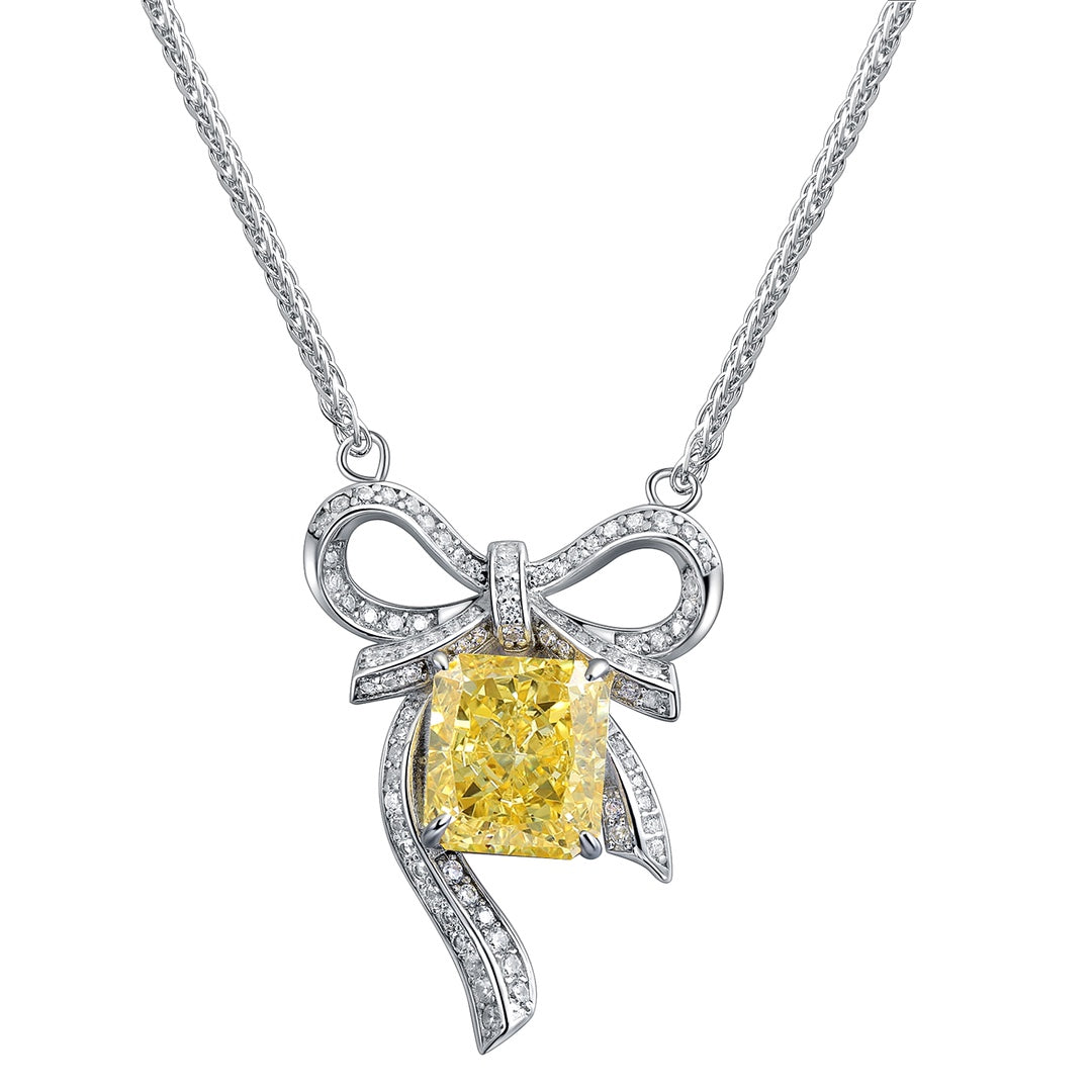 S925 silver necklace, with delicate clasp. Bow - knot design holds yellow lab - grown diamond, bright color, lovely shape.