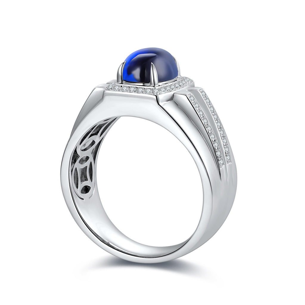 Open-end S925 silver ring, claw setting embraces oval lab-grown sapphire. Vibrant blue, sleek shape exudes charm.