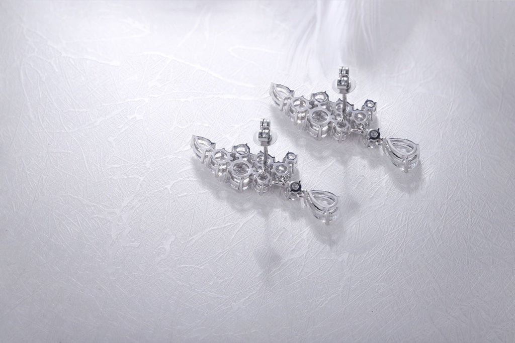 S925 silver earrings, simple clasp, crystal - clear lab gems, teardrop and circular shapes, pretty.