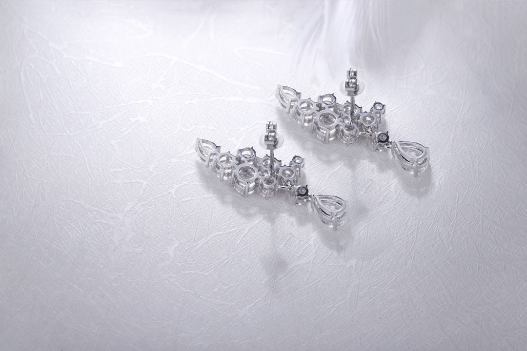 S925 silver earrings, simple clasp, crystal - clear lab gems, teardrop and circular shapes, pretty.
