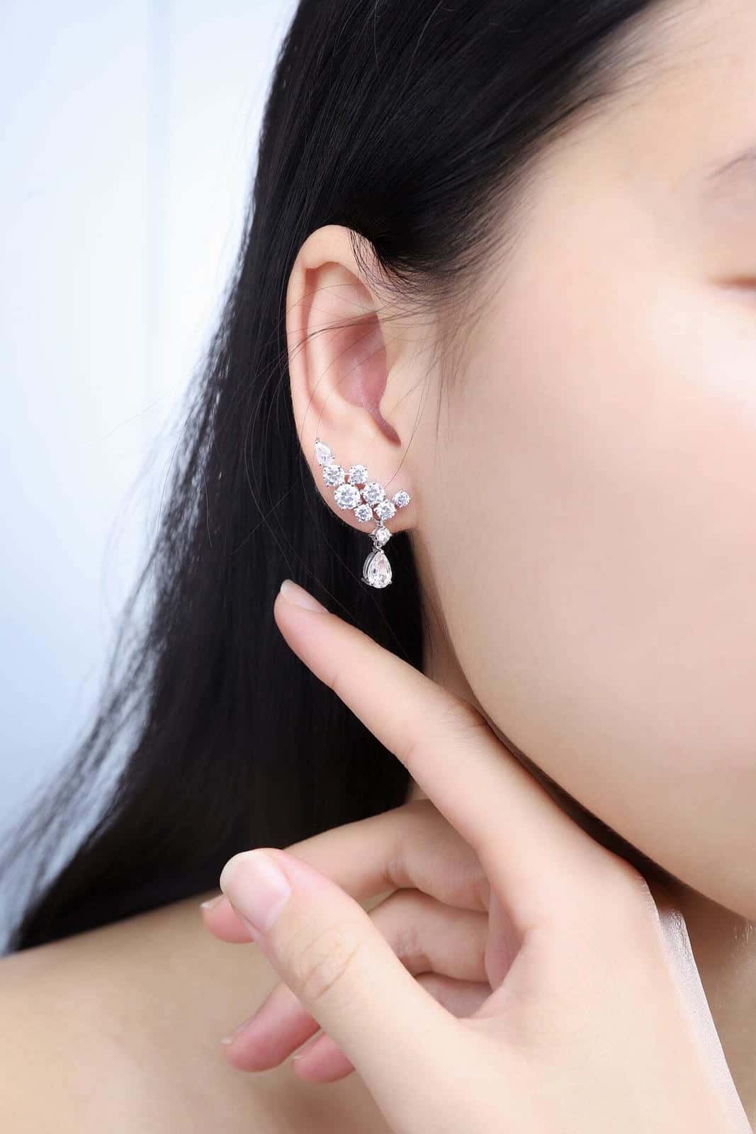 S925 silver studs, neat clasp design, sparkling clear gems, teardrop - shaped drops, elegant.