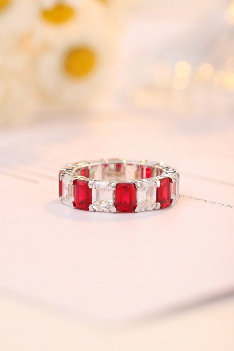 The S925 silver ring boasts a sturdy design. Red lab-grown rubies and diamonds set in circle, charming shape.