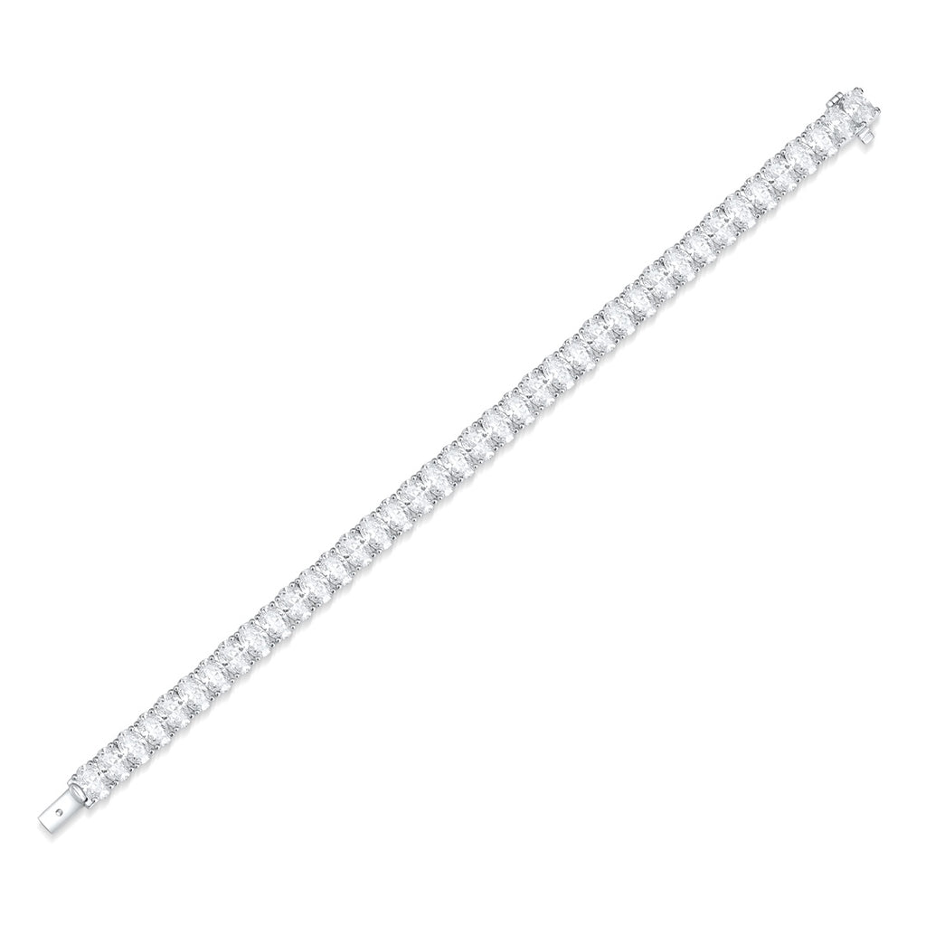 This S925 silver bracelet has a sturdy clasp. Full of clear cubic zirconia in a line, dazzling shape.