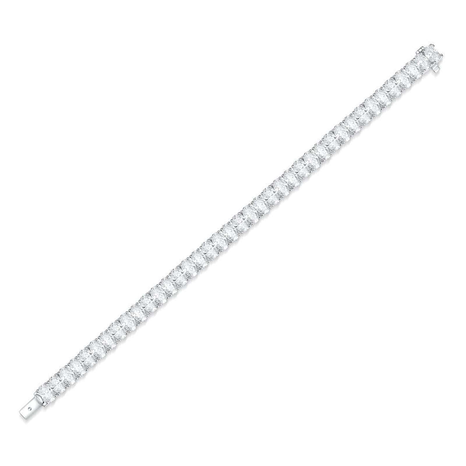 This S925 silver bracelet has a sturdy clasp. Full of clear cubic zirconia in a line, dazzling shape.