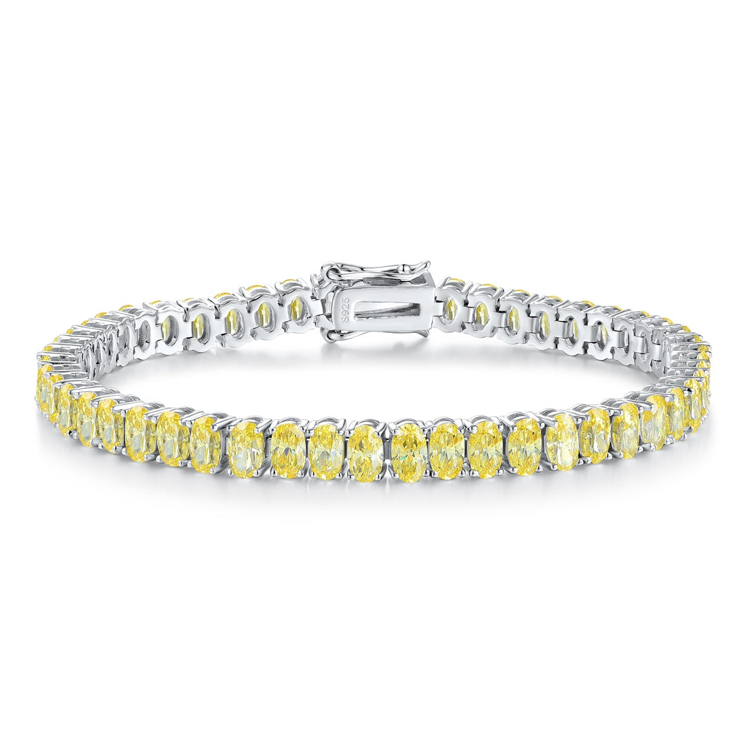 S925 silver bracelet, clasp secure. All yellow cubic zirconia, linear shape radiates warmth.