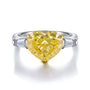 The S925 silver ring adopts an open design, with a setting setting off a heart-shaped yellow cubic zirconia. It has a bright 