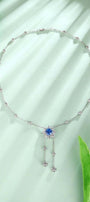 S925 silver pendant necklace with reliable clasp. Shows a flower-shaped deep-blue gem with dangling diamonds, stylish.