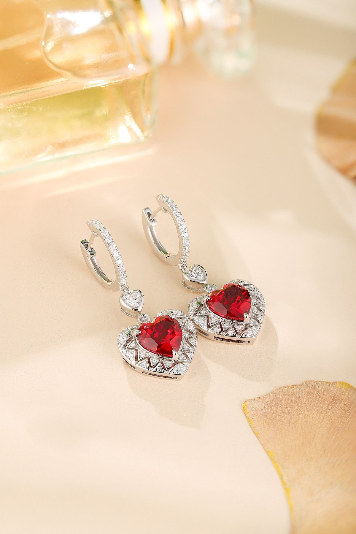 These earrings use S925 silver with reasonable and secure ear hook and clasp designs. The vivid heart-shaped lab-grown rubies