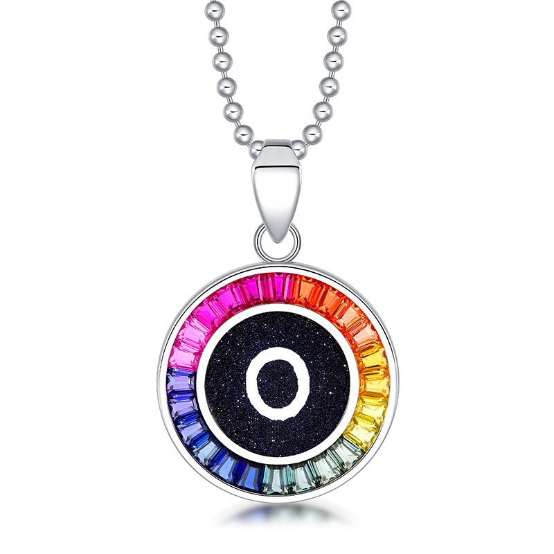 Petite S925 silver necklace, ball - chain design. Features a round "O" pendant, multi - colored with lab - grown sapphires.