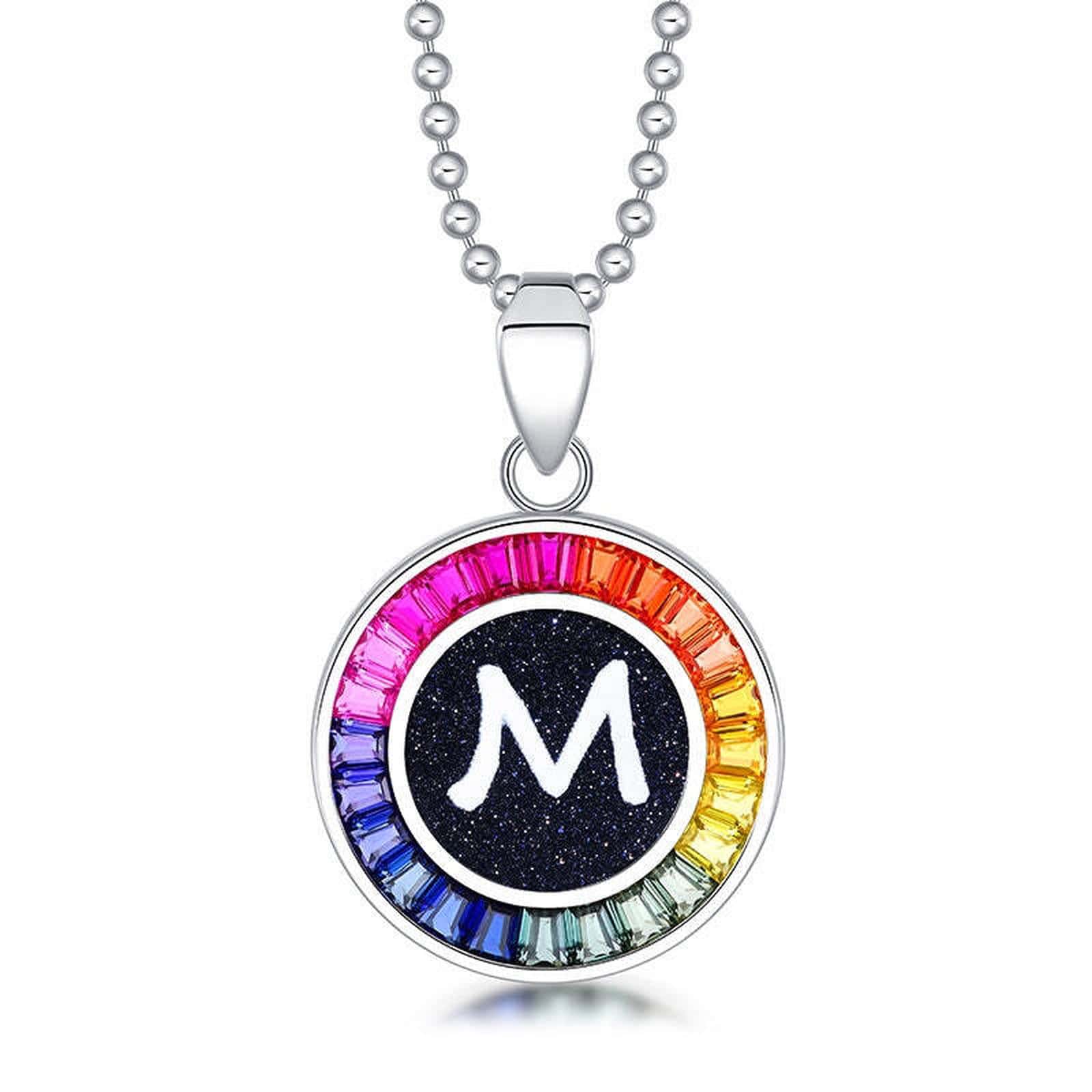 Petite S925 silver necklace, ball - chain design. Features a round "M" pendant, multi - colored with lab - grown sapphires.