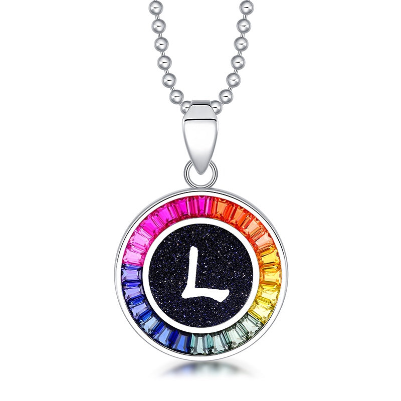 Petite S925 silver necklace, ball - chain design. Features a round "L" pendant, multi - colored with lab - grown sapphires.