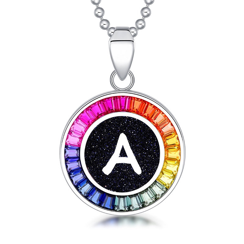 Petite S925 silver necklace, ball - chain design. Features a round "A" pendant, multi - colored with lab - grown sapphires.