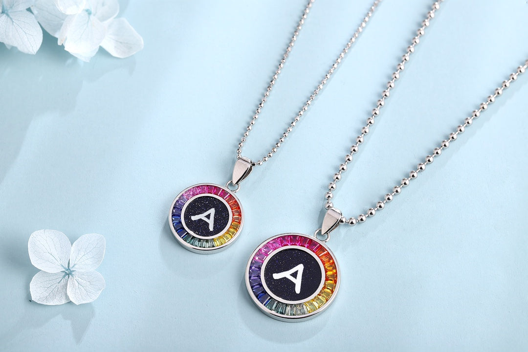 This S925 sterling silver necklace features A-Z letters. Chain design simple, multi-colored, round pendants.