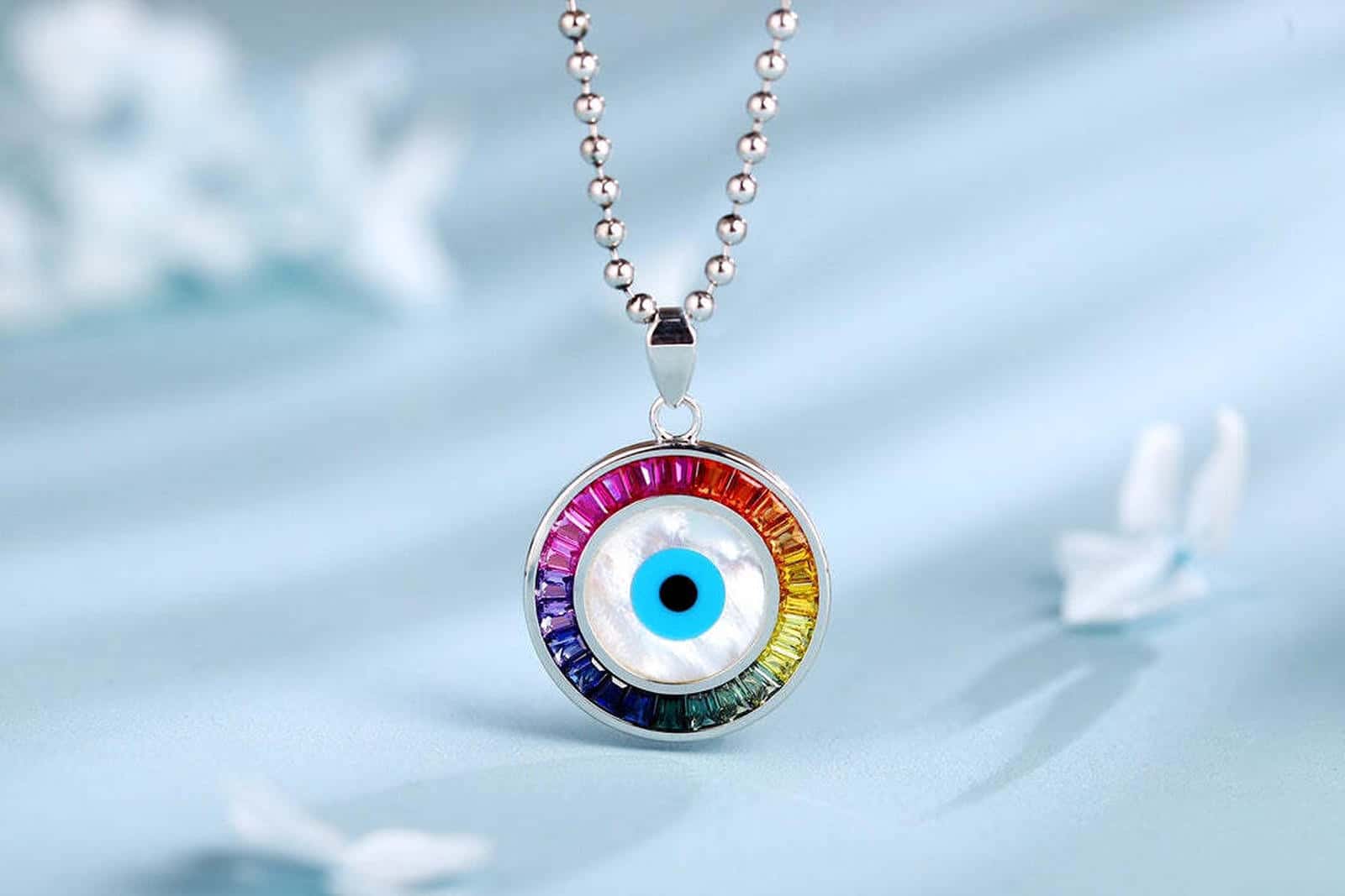 Large Size-S925 silver with a practical clasp, the round pendant is eye-shaped, surrounded by multi-colored gems, rich in col