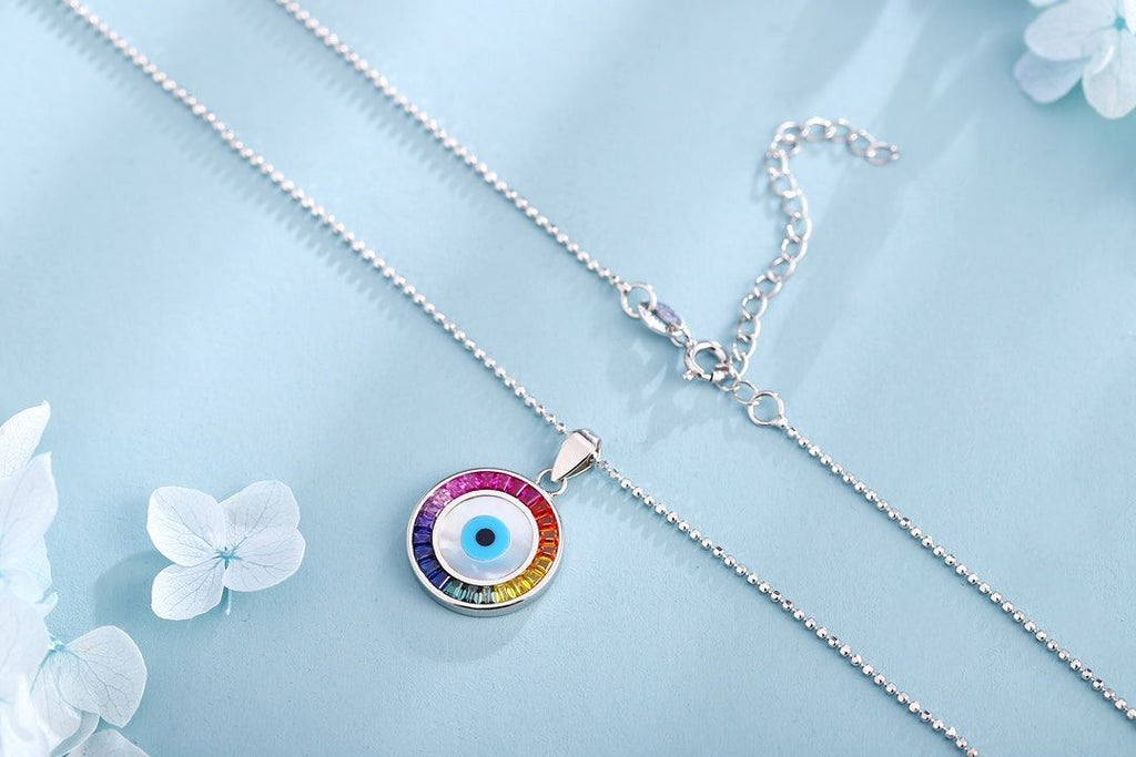 Petite Size-S925 silver with a simple clasp, the round pendant is eye-shaped, colored gems surround the blue eye, with gorgeo
