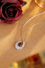 It has a natural deep-red garnet set in the center, with rich and gorgeous color.