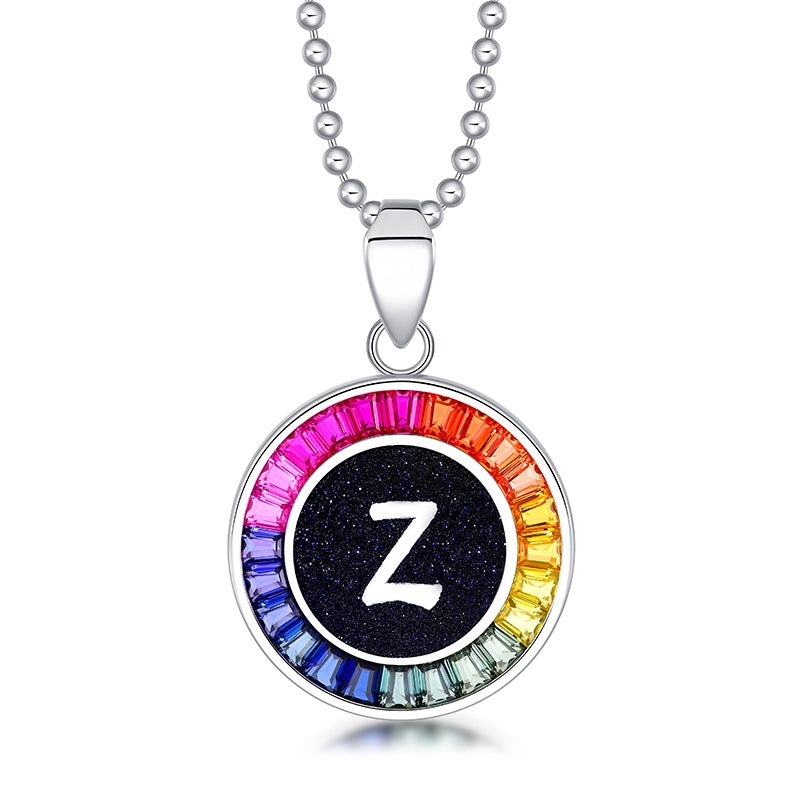 S925 silver necklace in large size, chain design simple. Round "Z" pendant, multi - hued from lab - grown sapphires.