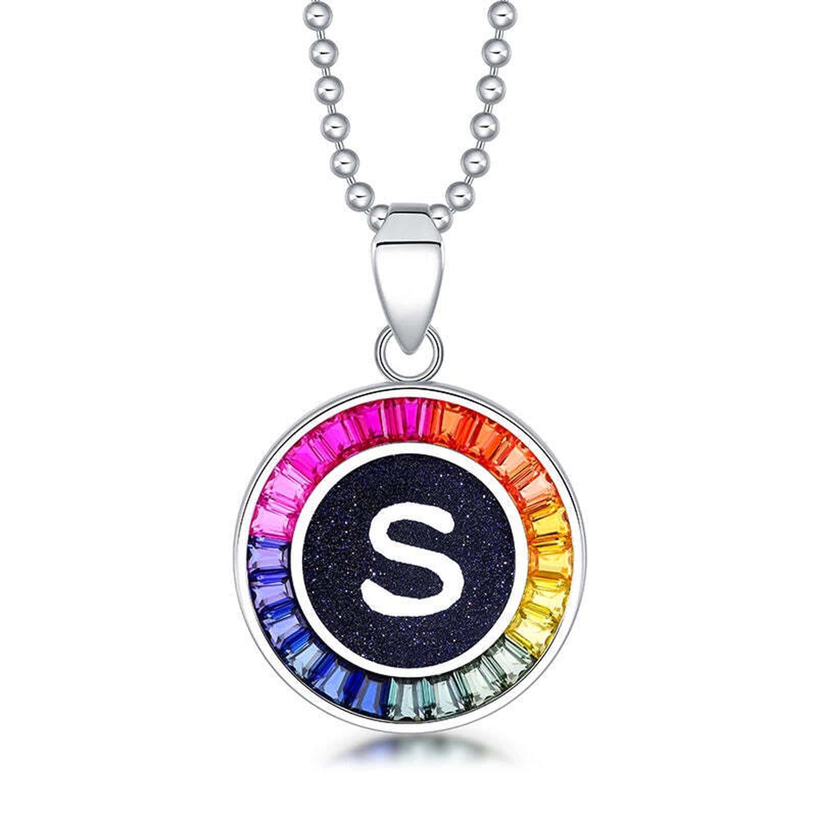 Petite S925 silver necklace, ball - chain design. Features a round "S" pendant, multi - colored with lab - grown sapphires.