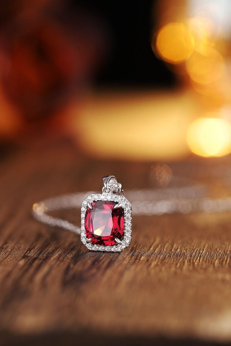 S925 silver pendant necklace with secure clasp. Shows a square-shaped deep-red natural garnet encircled by diamonds, charming