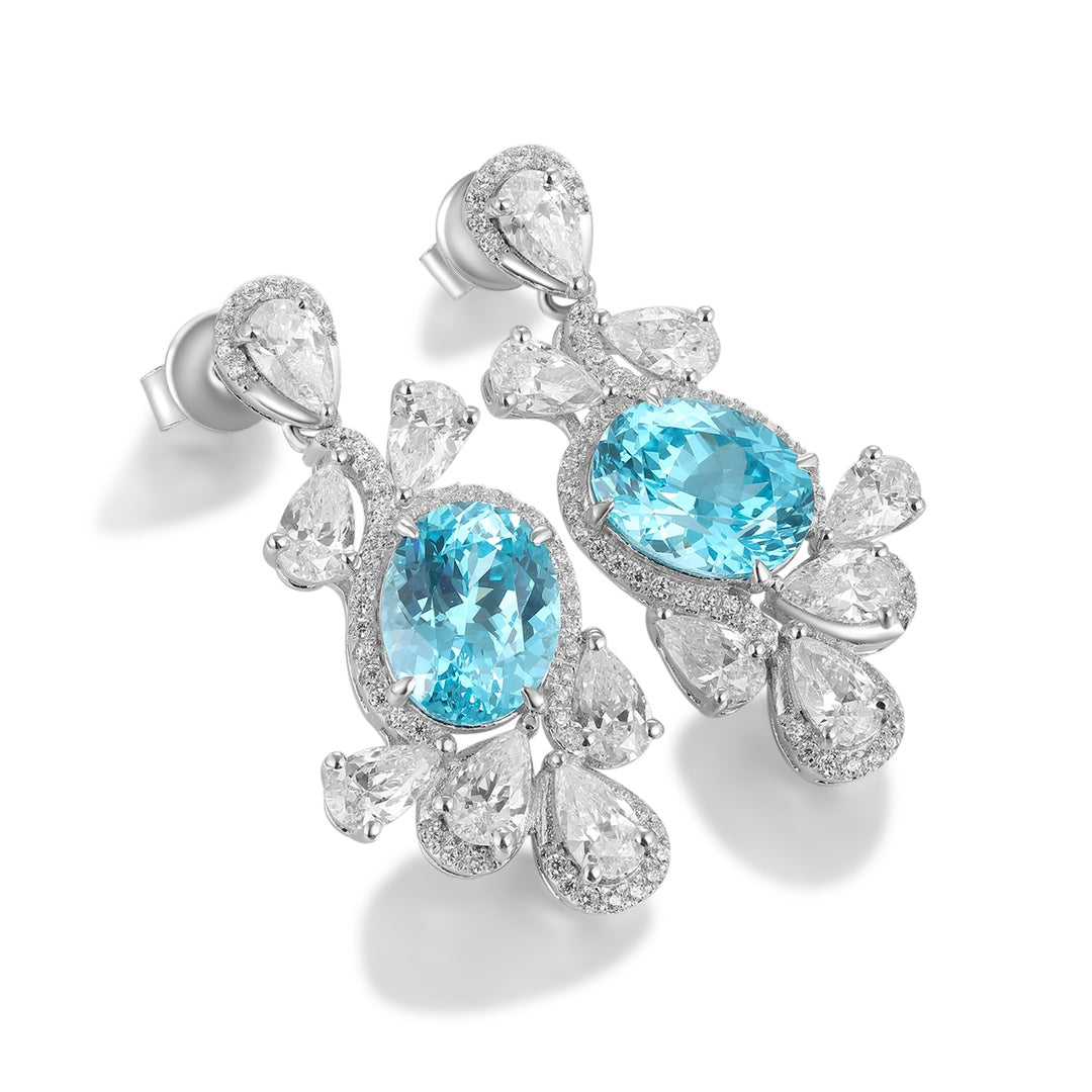 The S925 silver stud earrings have practical clasps. The lab-grown Paraiba main stones have a charming color, with lake blue 