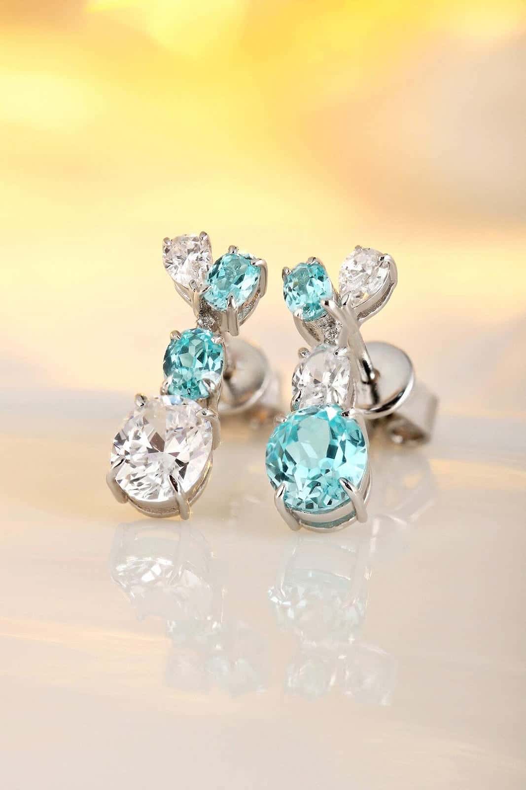 These S925 silver stud earrings have a simple and practical clasp design. The square - shaped turquoise - blue lab - grown ge