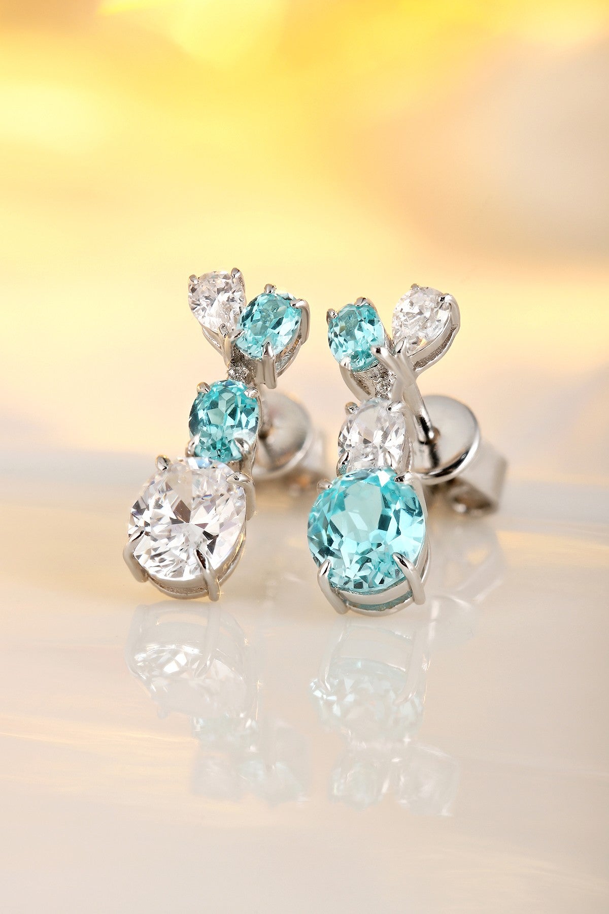 These S925 silver stud earrings have a simple and practical clasp design. The square - shaped turquoise - blue lab - grown ge