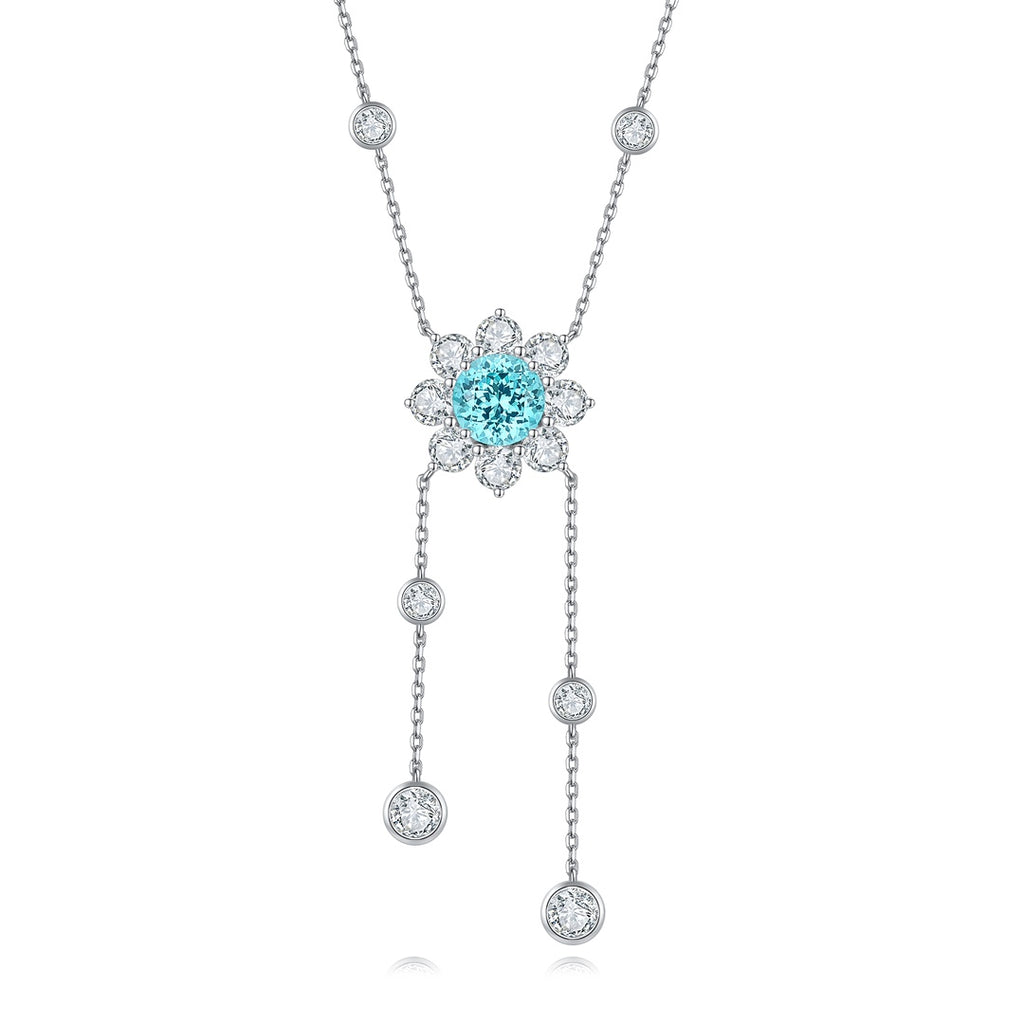S925 silver pendant necklace. Delicate chain with clasp, light blue gem surrounded by diamonds in floral shape, elegant.