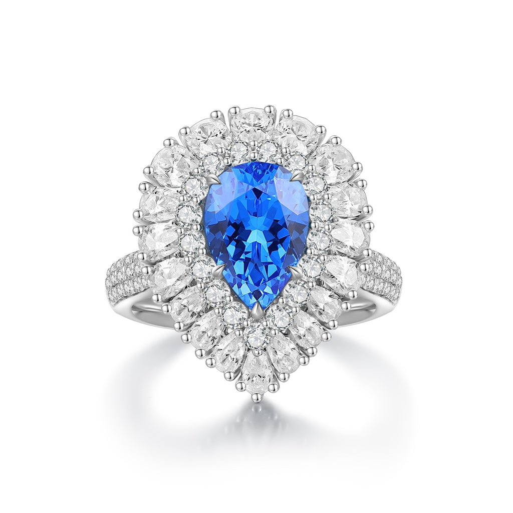 S925 silver ring, no opening (solid design). Pear - shaped electric blue lab - grown Paraiba surrounded by diamond halo.