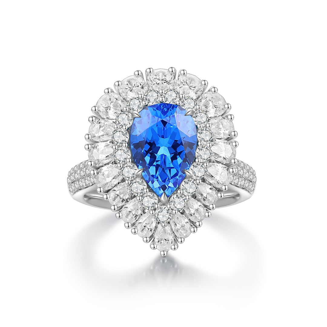 S925 silver ring, no opening (solid design). Pear - shaped electric blue lab - grown Paraiba surrounded by diamond halo.