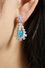 S925 silver stud earrings, dependable clasp. Lake-blue lab-grown diamond in floral motif, serene color, graceful teardrop sha