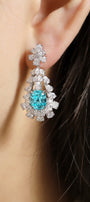 S925 silver stud earrings, dependable clasp. Lake-blue lab-grown diamond in floral motif, serene color, graceful teardrop sha