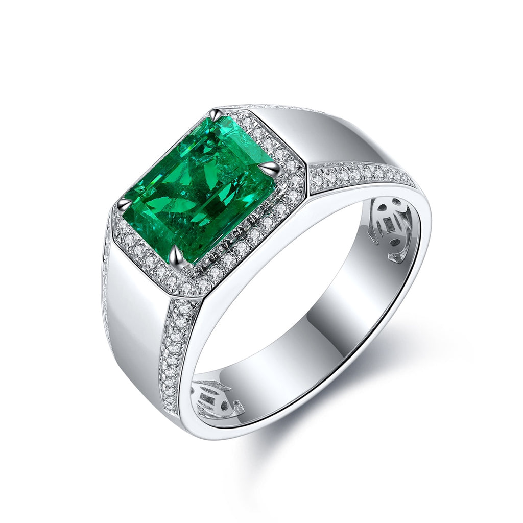 S925 silver open-end ring, with claw setting holding rectangular lab-grown emerald. Fresh green color, shape is classic.