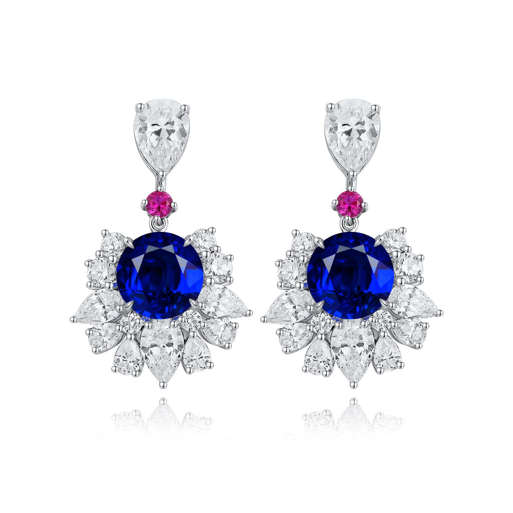 These stud earrings, made of S925 silver with delicate and secure clasps, feature lab-grown sapphires in rich royal blue as m