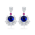 These stud earrings, made of S925 silver with delicate and secure clasps, feature lab-grown sapphires in rich royal blue as m