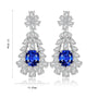 S925 silver stud earrings, reliable clasp. Deep - blue lab - grown diamond in floral design, classic teardrop shape.