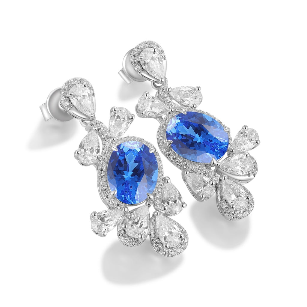 These stud earrings are made of S925 silver with a delicate and secure ear clasp design. The lab-grown cobalt spinel main sto