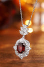 Made of natural garnet, with a chic floral design and clasp, the deep-red main stone looks gorgeous against the diamonds.
