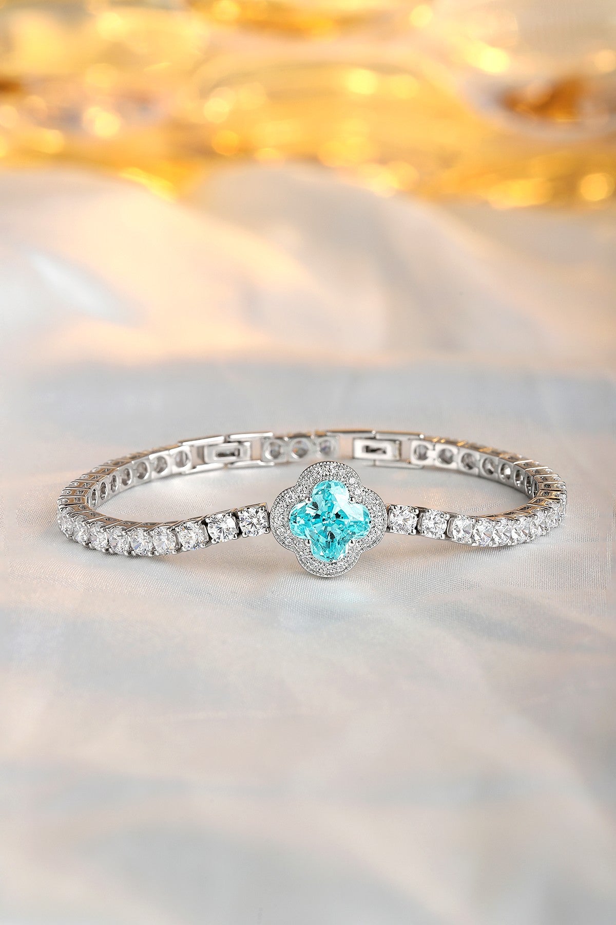 S925 silver bracelet, secure clasp design. Floral pattern with a vivid blue - green lab - grown diamond, lovely and delicate 