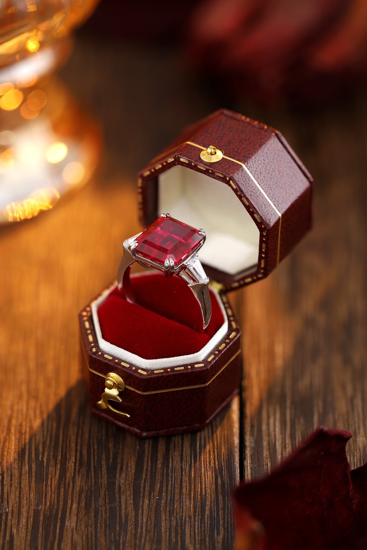 The S925 silver open - end ring has a claw - set square red ruby. The red is as warm as a flame, the shape is square, and the