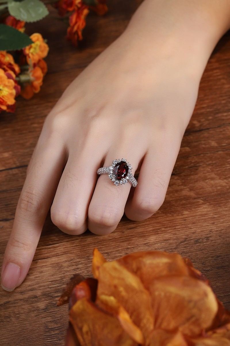 S925 silver ring featuring opening. Oval deep - red natural garnet with diamond frame, flexible design.