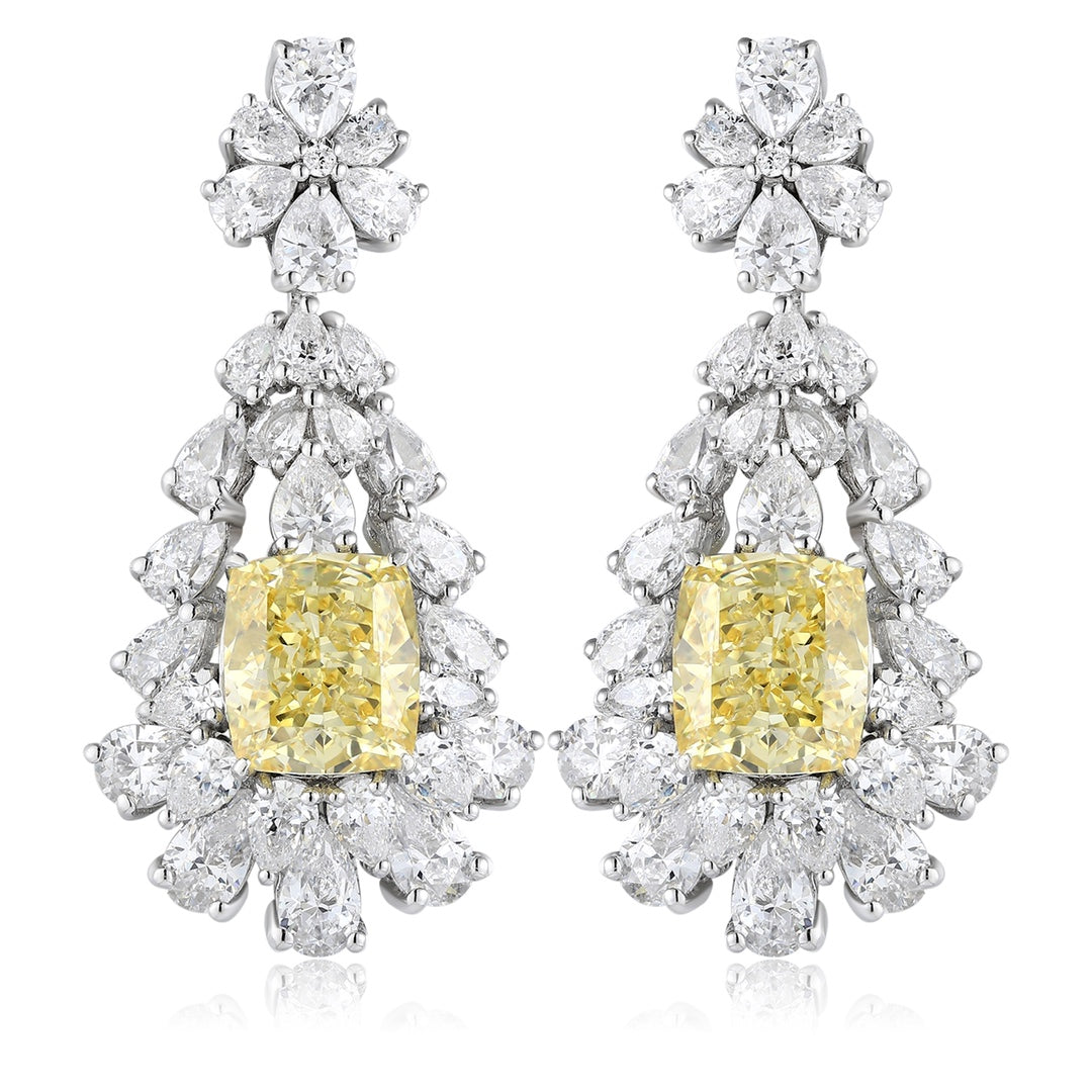 S925 silver stud earrings, sturdy clasp. Yellow lab - grown diamond in floral setting, bright color, teardrop shape.