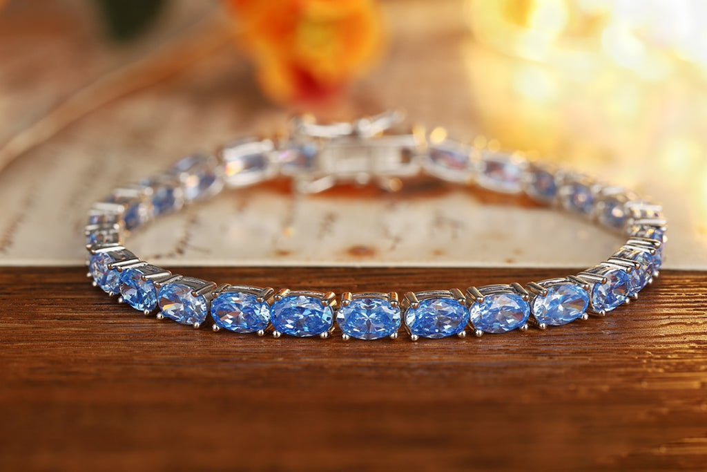 S925 silver bracelet, vivid blue, oval - cut stones, with a fine clasp, charming.