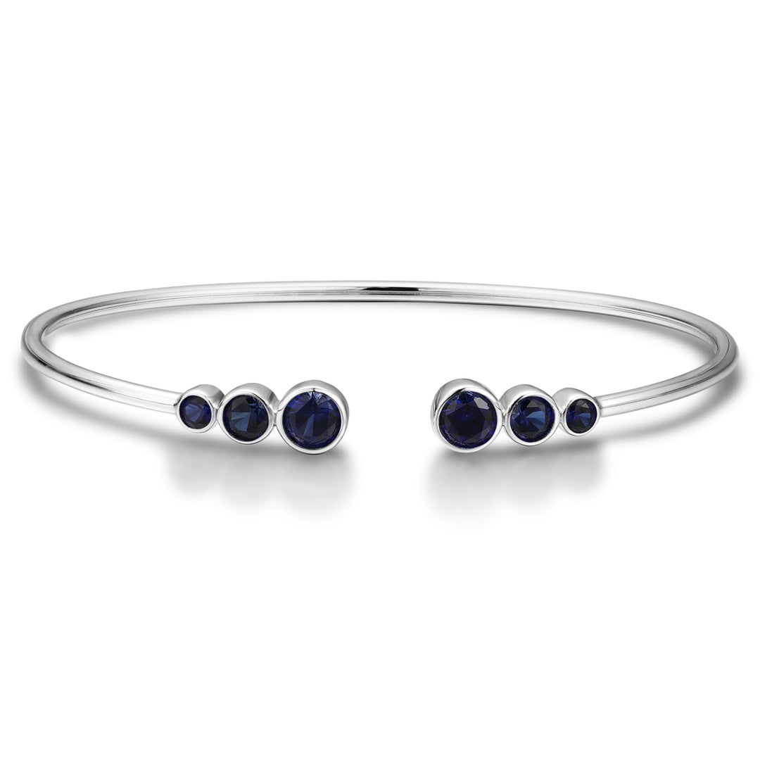 S925 silver open cuff bracelet with deep - blue sapphires, round gems, simple and practical open design.